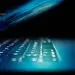 closeup photo of turned-on blue and white laptop computer